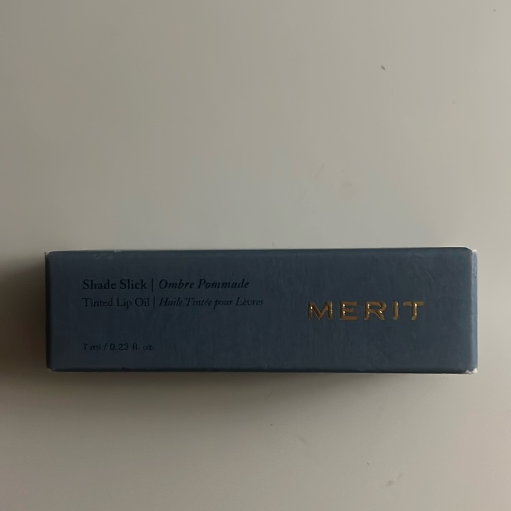 merit lip oil shade slick in taupe